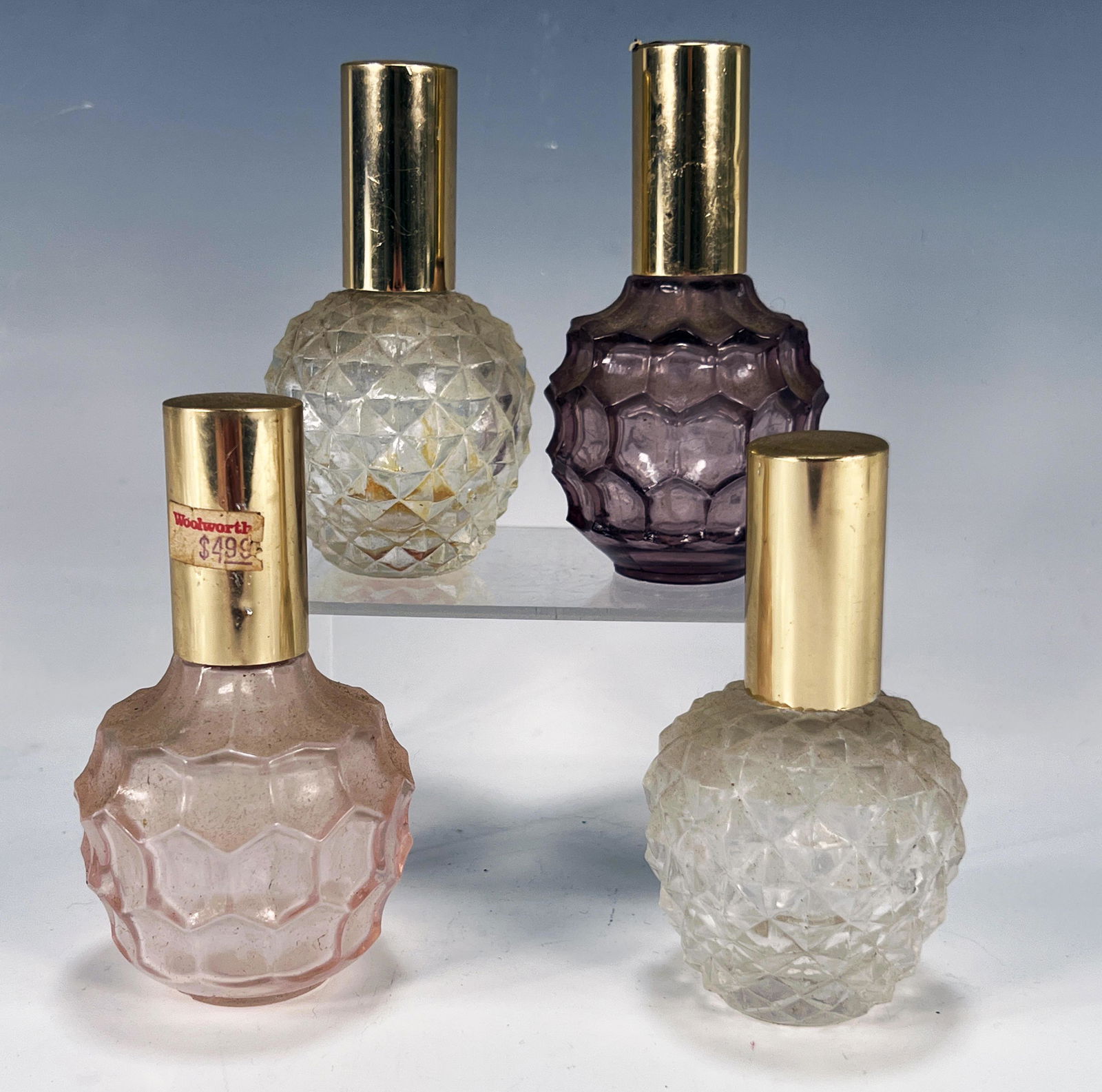 FOUR GLASS PERFUME BOTTLES (1 of 3)