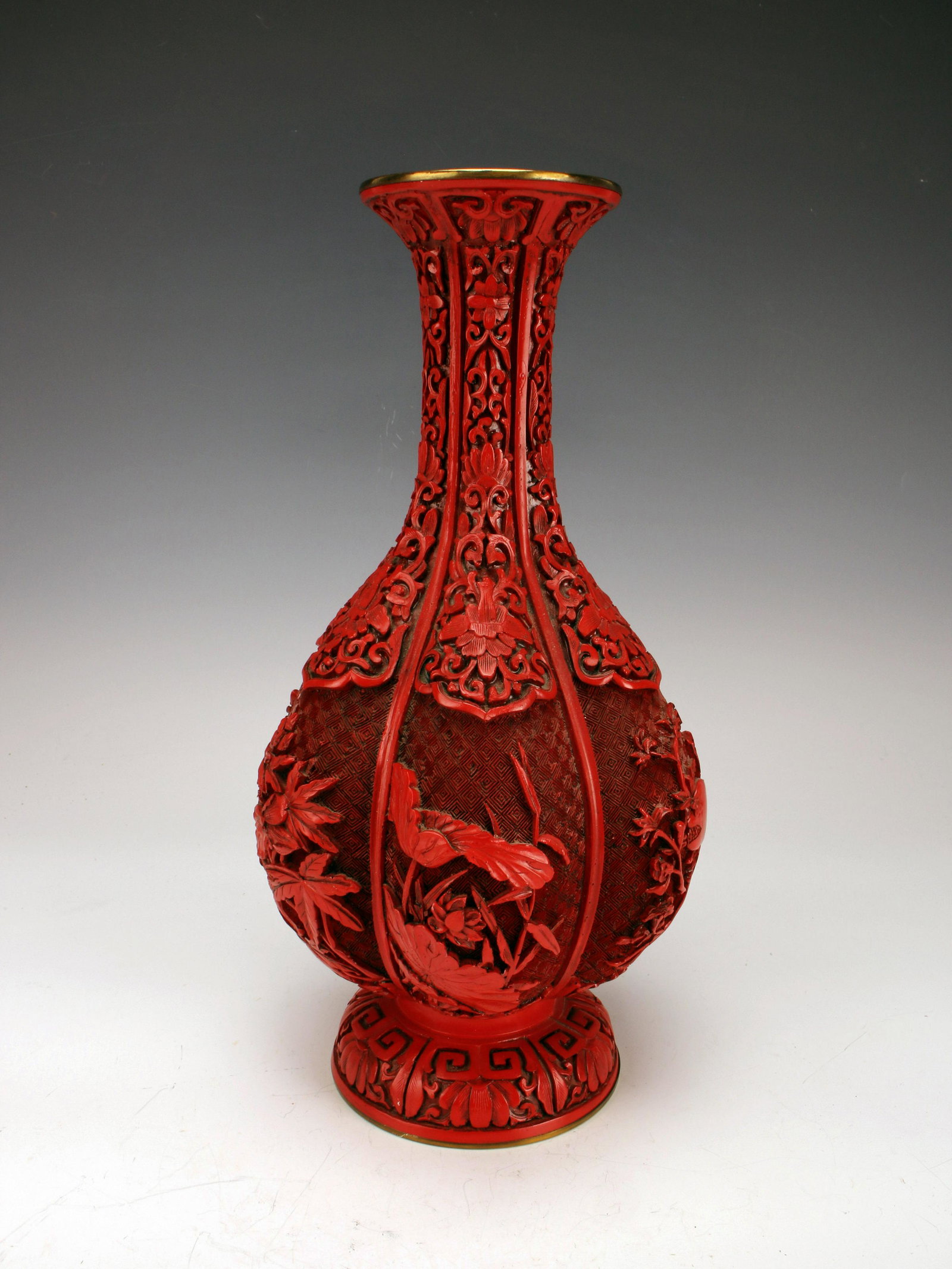 CINNABAR LOBED BOTTLE VASE: CINNABAR LOBED BOTTLE VASE </