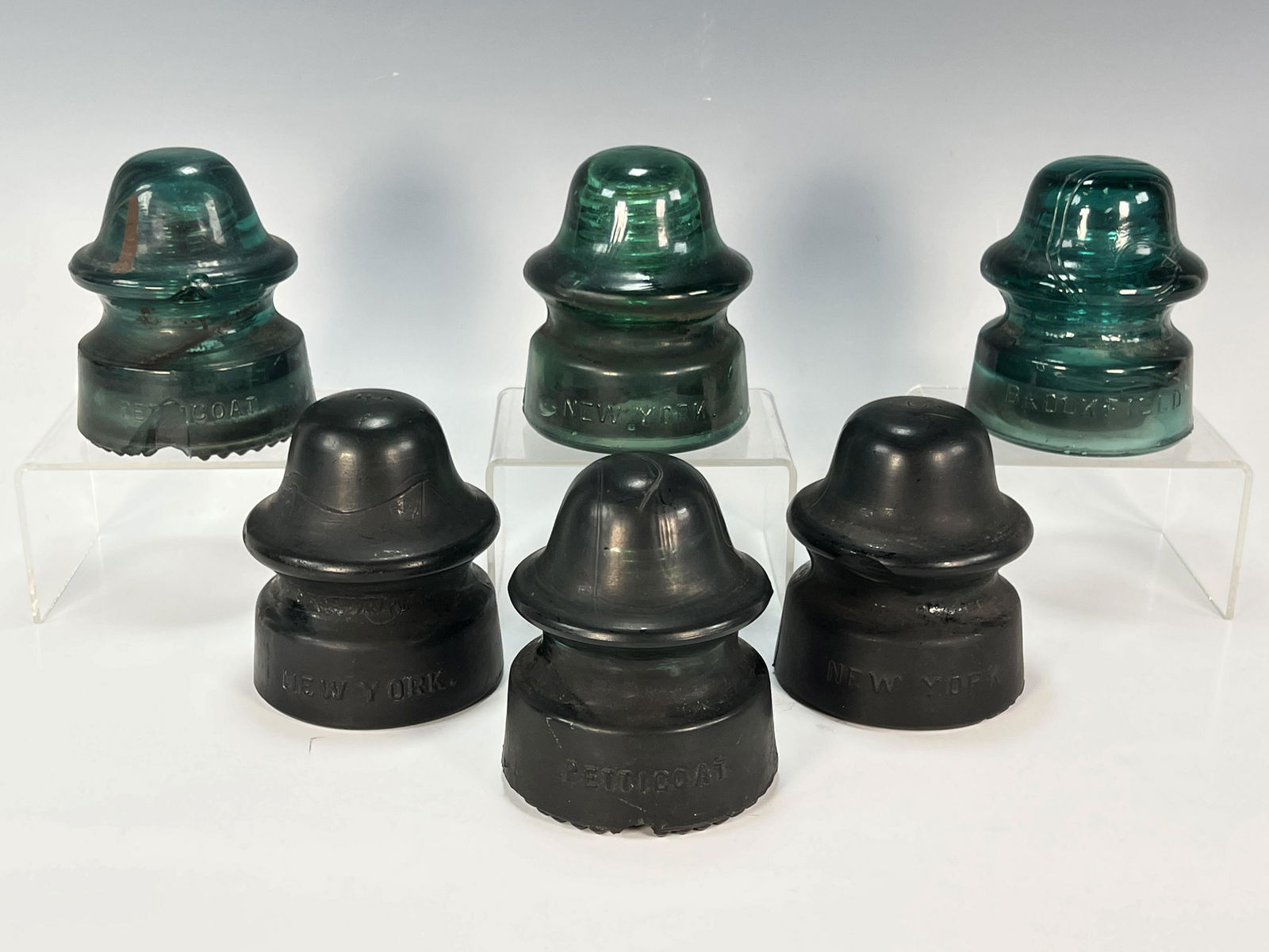 SIX VINTAGE GREEN GLASS INSULATORS (1 of 3)