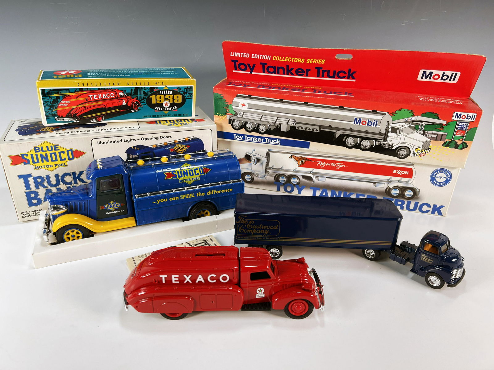 LOT OF OIL COMPANY COLLECTIBLE TRUCKS BANKS (1 of 2)