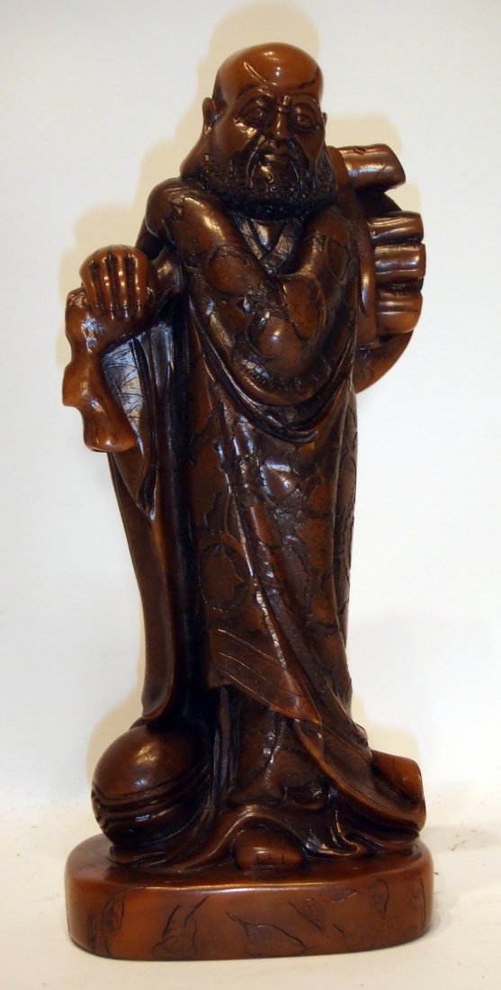 Soapstone Carved Louhan: A fine soapstone carved statuette of a Chinese Louhan, 10". Shipping: We are able to pack and ship this item to an address in the United States for $30.00 via USPS Priority Mail. Tracking information 
