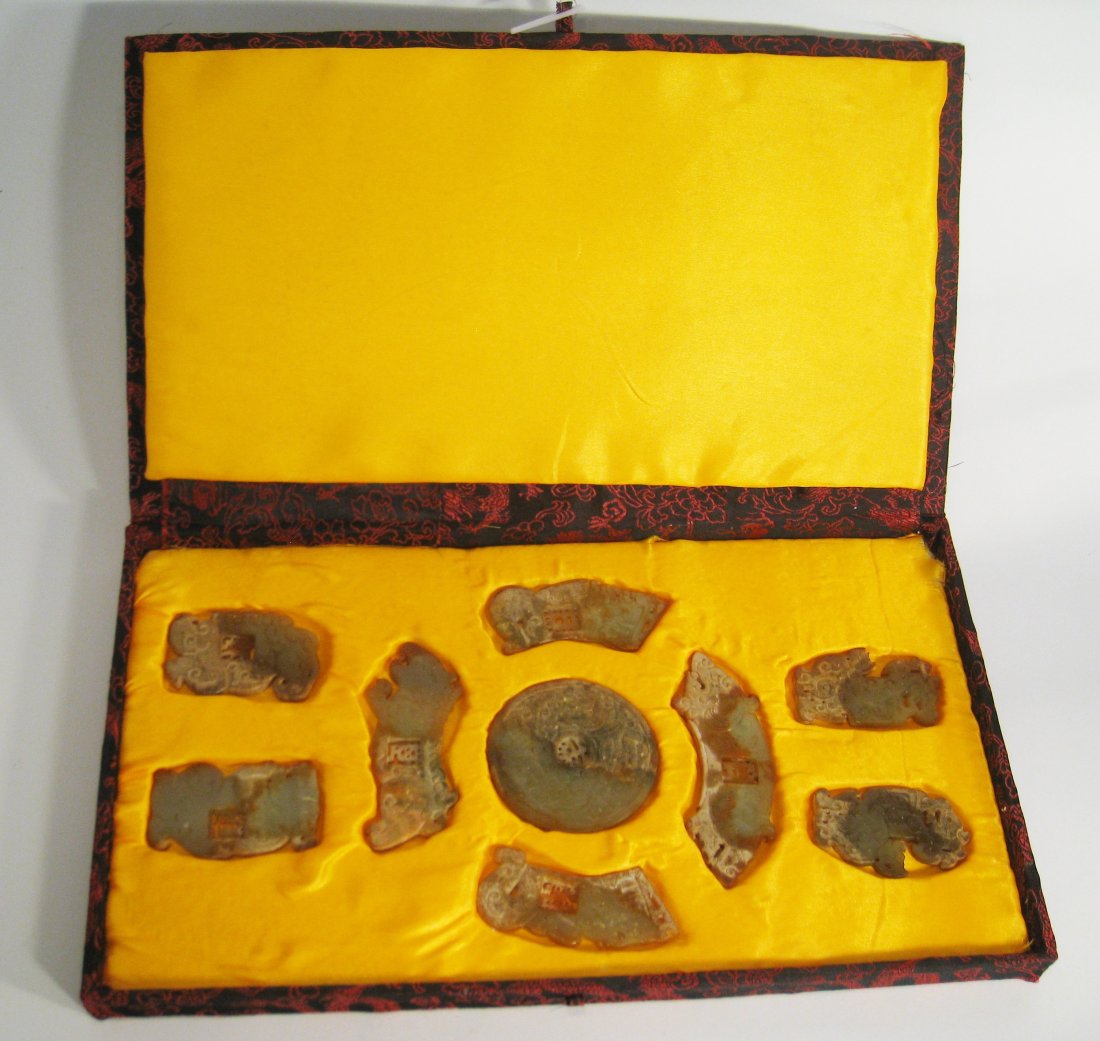 Set Antique Jade Items: Nine separate carved jade items of certain creatures within a presentation box, 16" X 9". Shipping: We are able to pack and ship this item to an address in the United States for $30.00 via USPS Priori