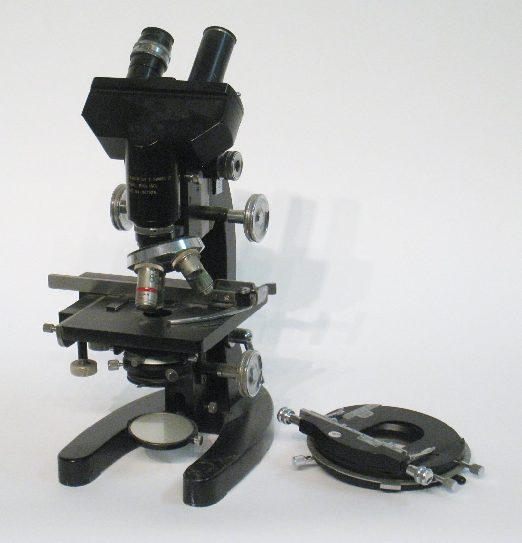 Microscope And Adjustable Stage: A fine microscope by Cooke, Throughton, Simms, New York, marked 25mm, with 80X , 5X and 10X power. Comes with adjustable stage. Shipping: We are able to pack and ship this item to an address in the Un