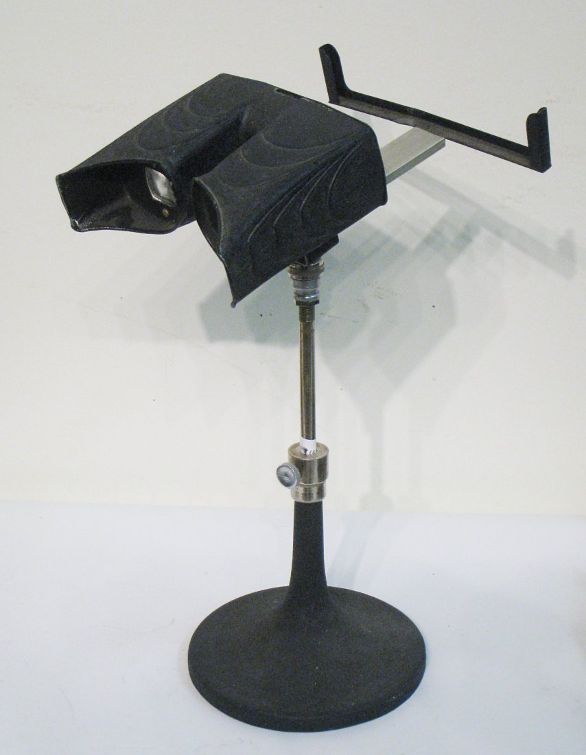 A Fine 19th Century Standing Stereo Viewer: Of metal, with a base that adjusts. Shipping: We are able to pack and ship this item to an address in the United States for $30.00 via USPS Priority Mail. Tracking information will be sent to your ema