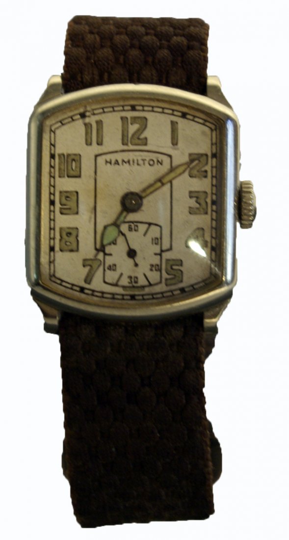 Hamilton Wrist Watch: A vintage Deco style wrist watch with a radium dial (signed "Hamilton") and a 14K white gold filled case. Running but need cleaning. Shipping: We are able to pack and ship this item to an address in t
