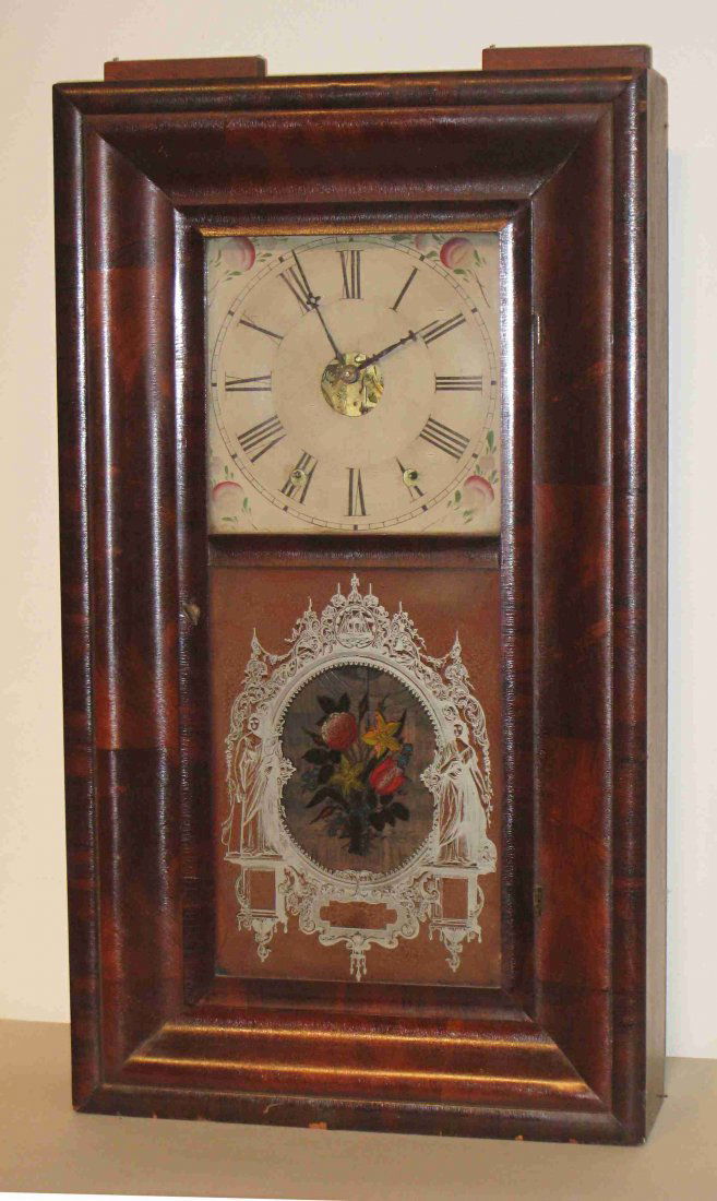 American 8 Day Ogee Shelf Clock: An American classic, the ogee clock, was first made popular as an inexpensive domestic clock in the 1830s, as an evolutionary growth from the earlier wooden works shelf clocks. This one is by the Forr