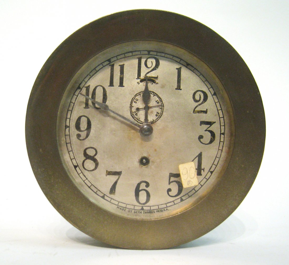 Ships Clock: A solid brass cast 7 1/4" case with ships timepiece by Seth Thomas. Running but will need cleaning. Shipping: We are able to pack and ship this item to an address in the United States for $30.00 via U