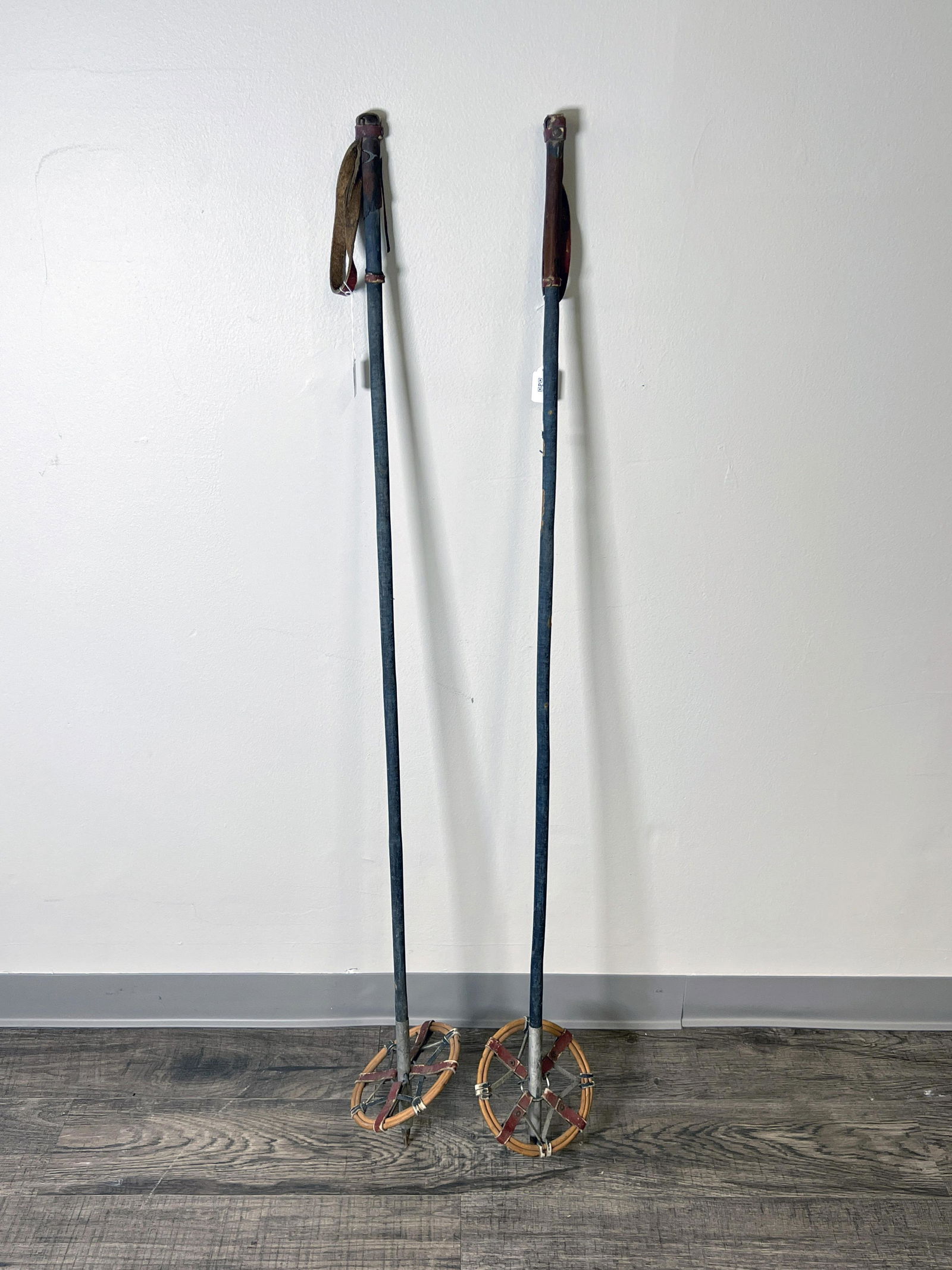 ANTIQUE PAIR LEATHER AND BAMBOO SKI POLES (1 of 3)