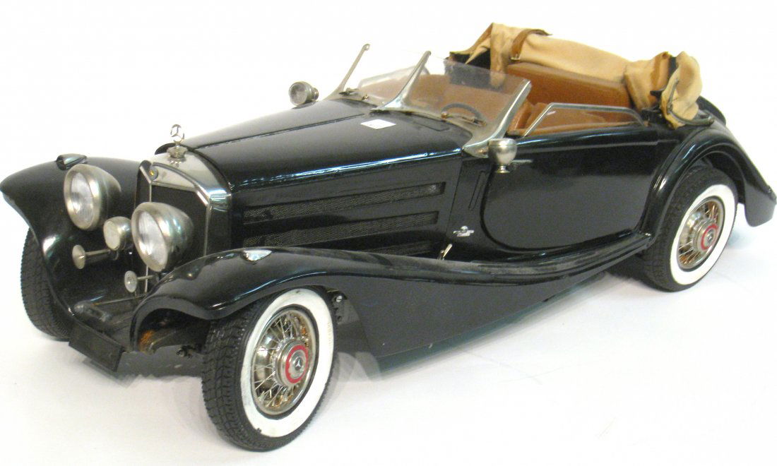 Model Mercedes in large 27" scale.: A mostly plastic finely detailed model of a Mercedes touring car, about 27" in length. Shipping: We are unable to ship this item. Please contact our local UPS Store, store1152@theupsstore.com, for a q