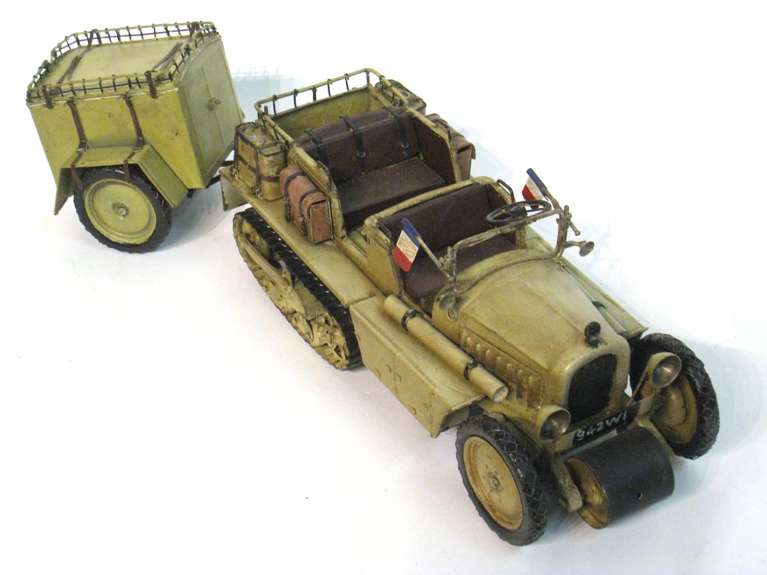 Model French Wwii Era Vehicle.: A utility half truck towing a small trailer. Shipping: We are able to pack and ship this item to an address in the United States for $50.00 via USPS Priority Mail or via FedEx Ground/Home Delivery. Tr