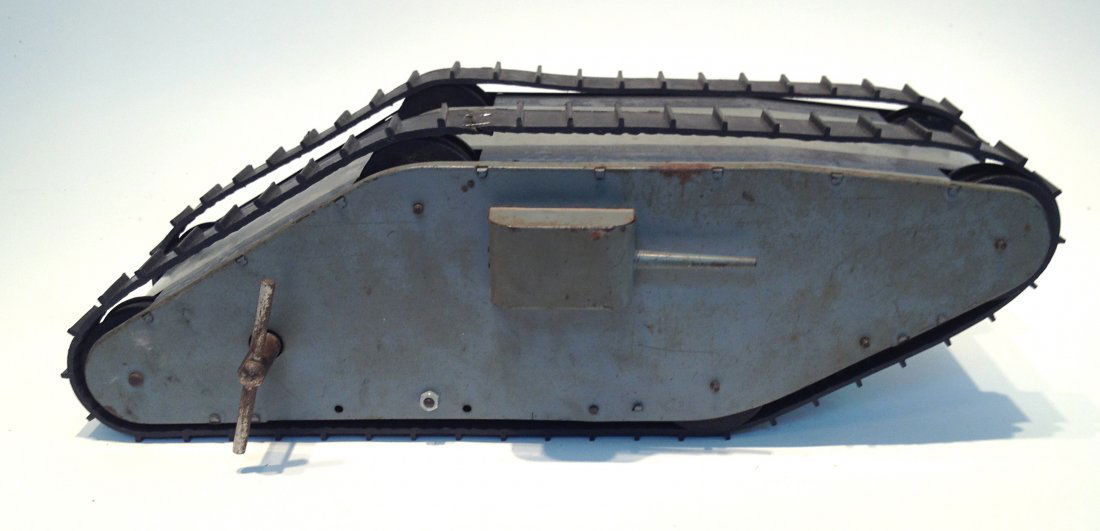 Wind Up Toy Tank: A model of a World War I tank. Wind up appears to be working. 14 1/2". Shipping: We are able to pack and ship this item to an address in the United States for $50.00 via USPS Priority Mail or via FedE