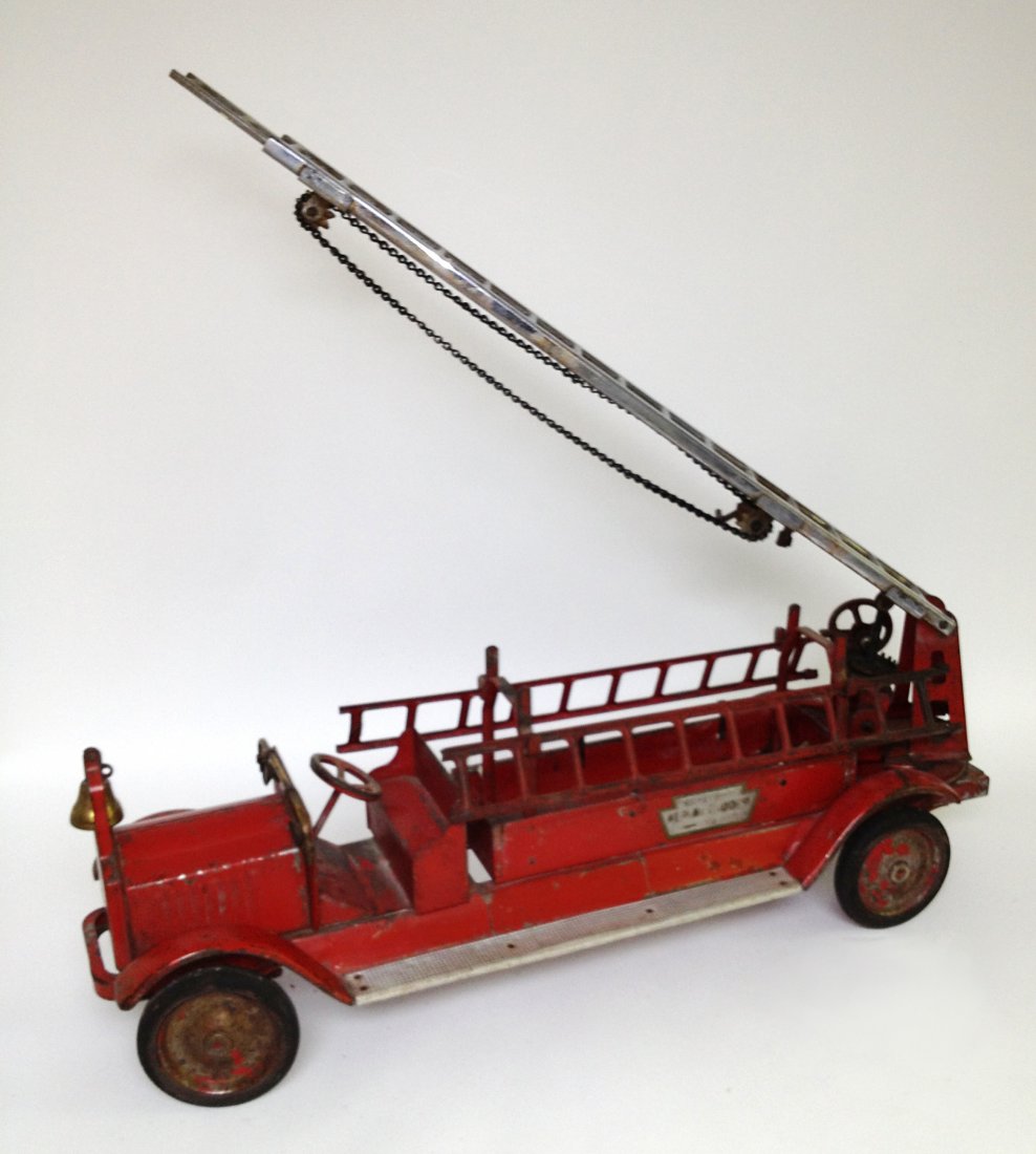 Keystone Latter Fire Truck: A 30" operating ladder truck with a working ladder lift and extender. With a decal indicating Keystone of Boston as the manufacturer. Shipping: We are unable to ship this item. Please contact our loca