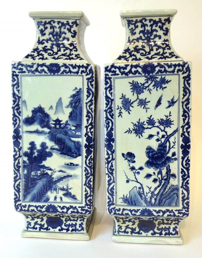A Pair Of Chinese Porcelain Vases.: Each squared, 17 1/2" in height with marked at the bottom. Decorated all around. Shipping: We are able to pack and ship this item to an address in the United States for $55.00 via USPS Priority Mail o