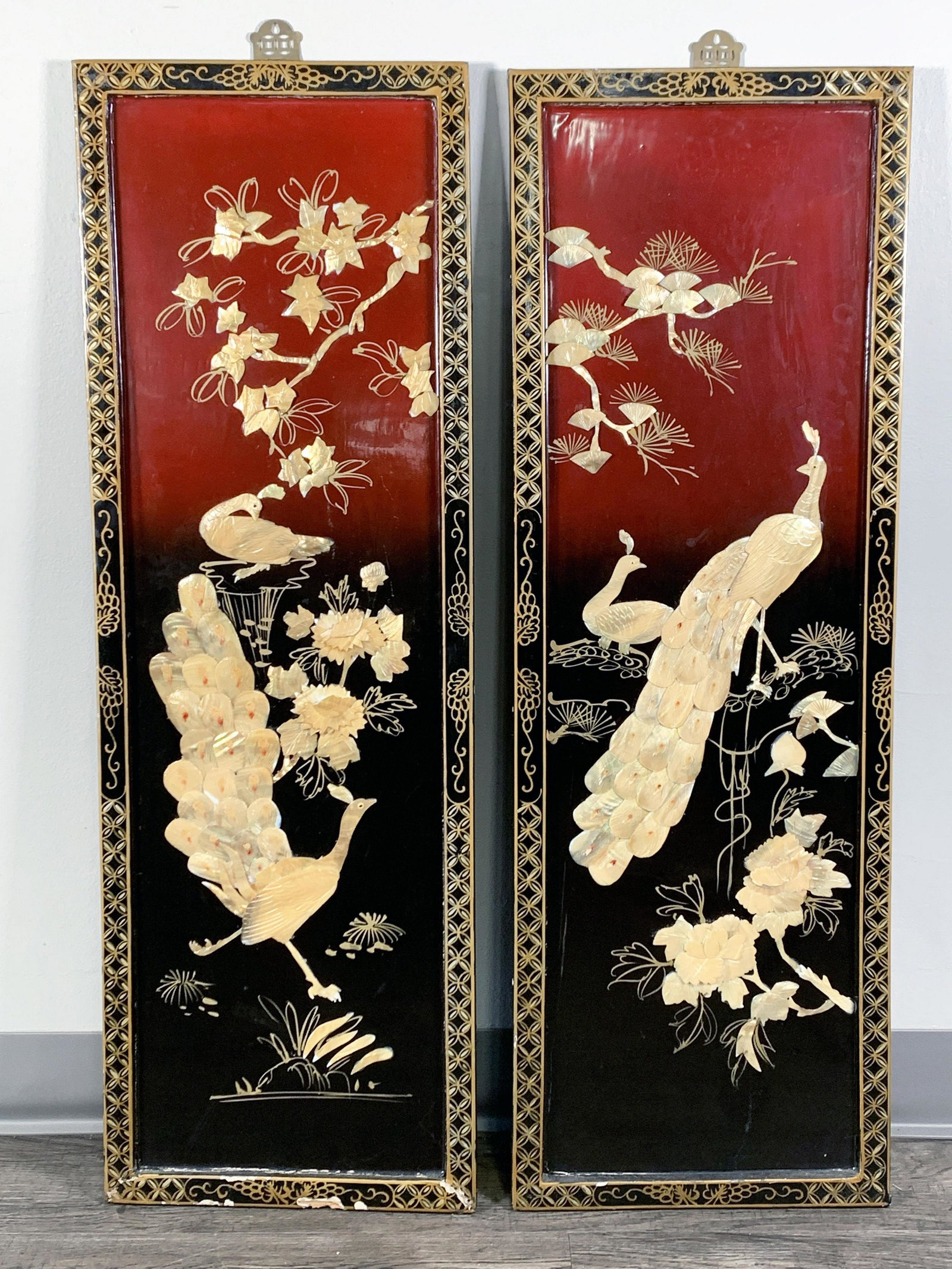 TWO CHINESE LACQUERED APPLIED MOTHER OF PEARL PEACOCK PANELS (1 of 3)
