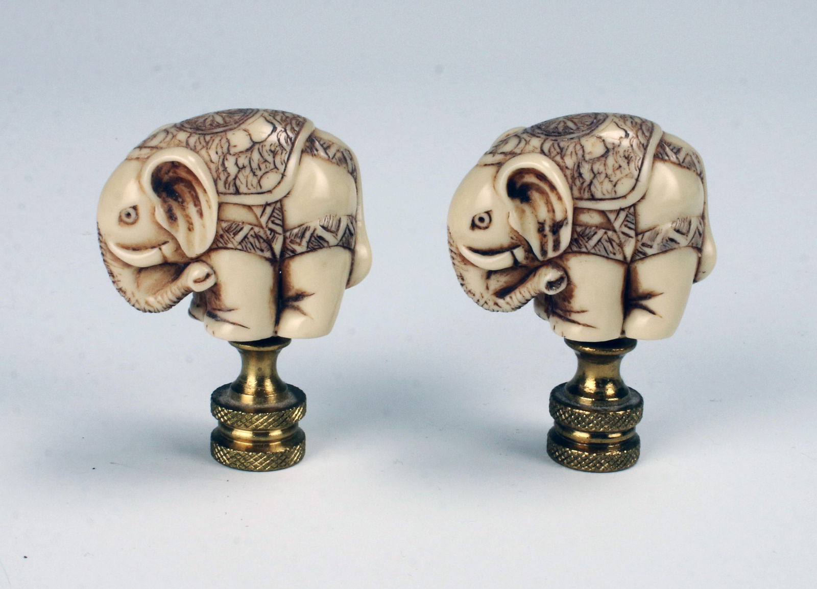 PAIR OF CARVED CHINESE RESIN ELEPHANT LAMP FINIALS (1 of 4)