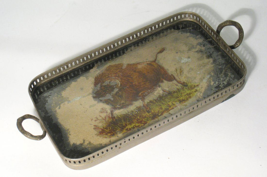 Small Tray Of American Interest: A 10 1/2" tray with a reverse painted glass bottom showing a buffalo. Shipping: We are able to pack and ship this item to an address in the United States for $25.00 via USPS Priority Mail. Tracking in