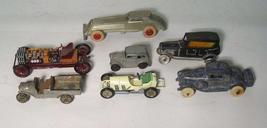 Assorted Toy Cars: Seven different die cast toy cars, all in "as found" condition. Longest 4"-5". Shipping: We are able to pack and ship this item to an address in the United States for $25.00 via USPS Priority Mail. Tr