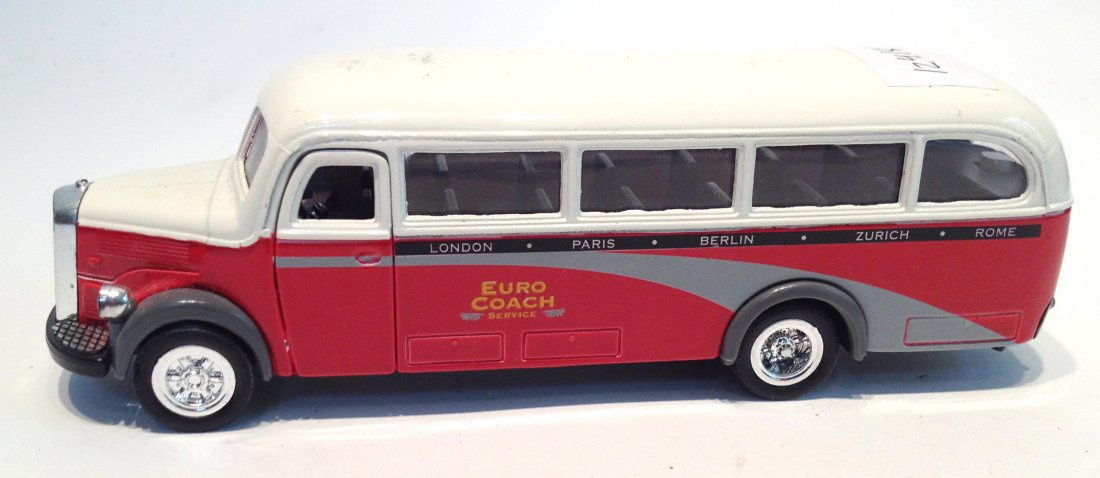 "Euro Coach" Toy Bus: In red and white and 6" in length. Shipping: We are able to pack and ship this item to an address in the United States for $25.00 via USPS Priority Mail. Tracking information will be sent to your emai