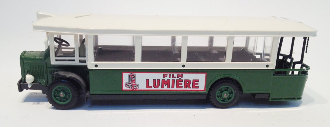 "Film Lumiere" Green & White Toy Bus: 7 1/4" in length. Shipping: We are able to pack and ship this item to an address in the United States for $25.00 via USPS Priority Mail. Tracking information will be sent to your email address. Each a
