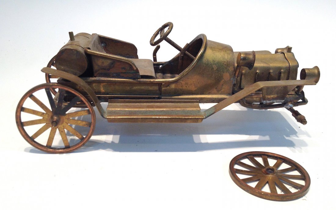 Brass Model Toy Motorcoach: One wheel off (looks easy to repair), this 8 1/2" model may not be too old but its quite carefully crafted. A nice model . Shipping: We are able to pack and ship this item to an address in the United 
