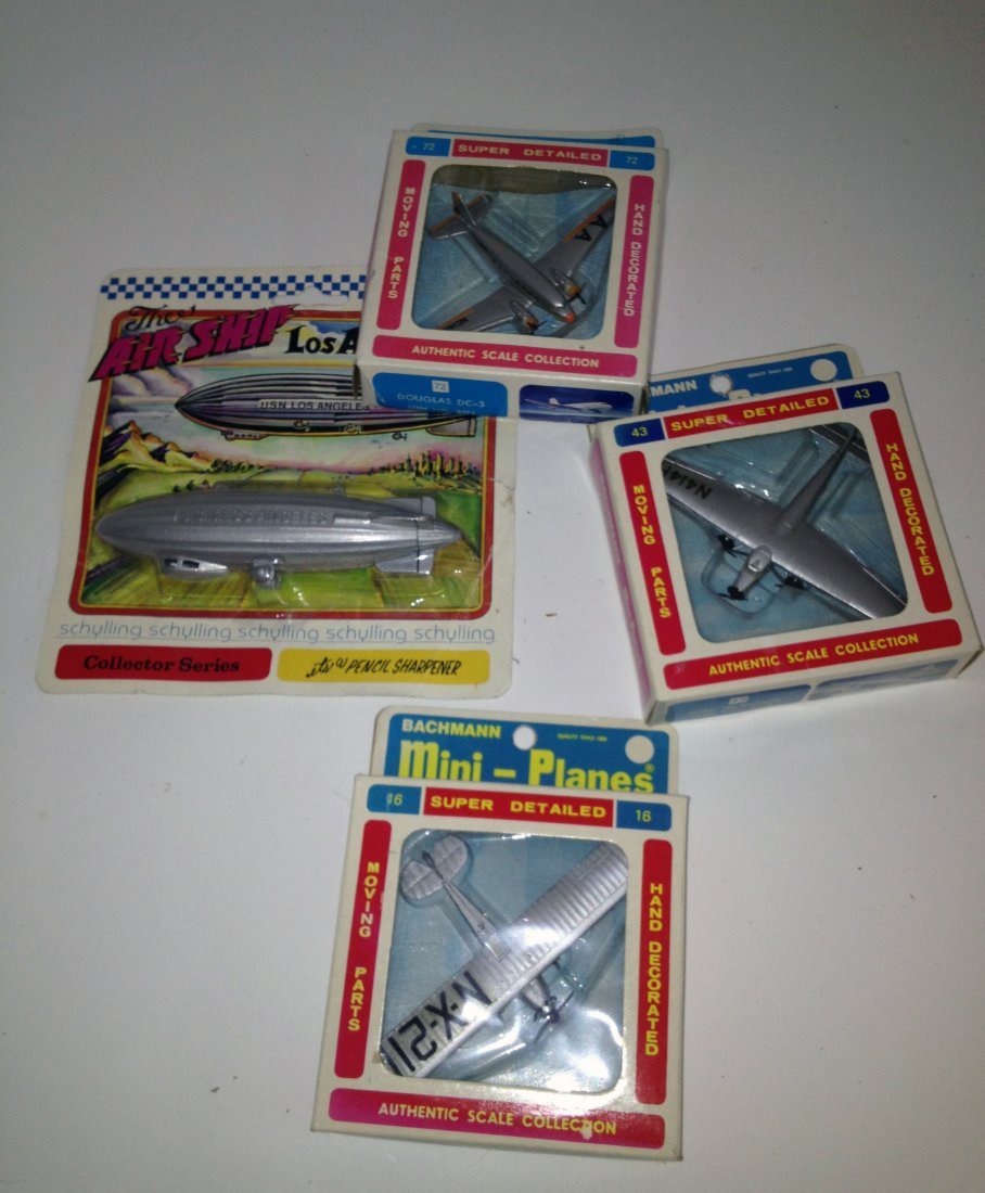 Four Boxed Model Planes: The Spirit of St. Louis; the Douglas DC 3; the Ford Tri-Motor; and the USS Los Angeles Shipping: We are able to pack and ship this item to an address in the United States for $25.00 via USPS Priority 