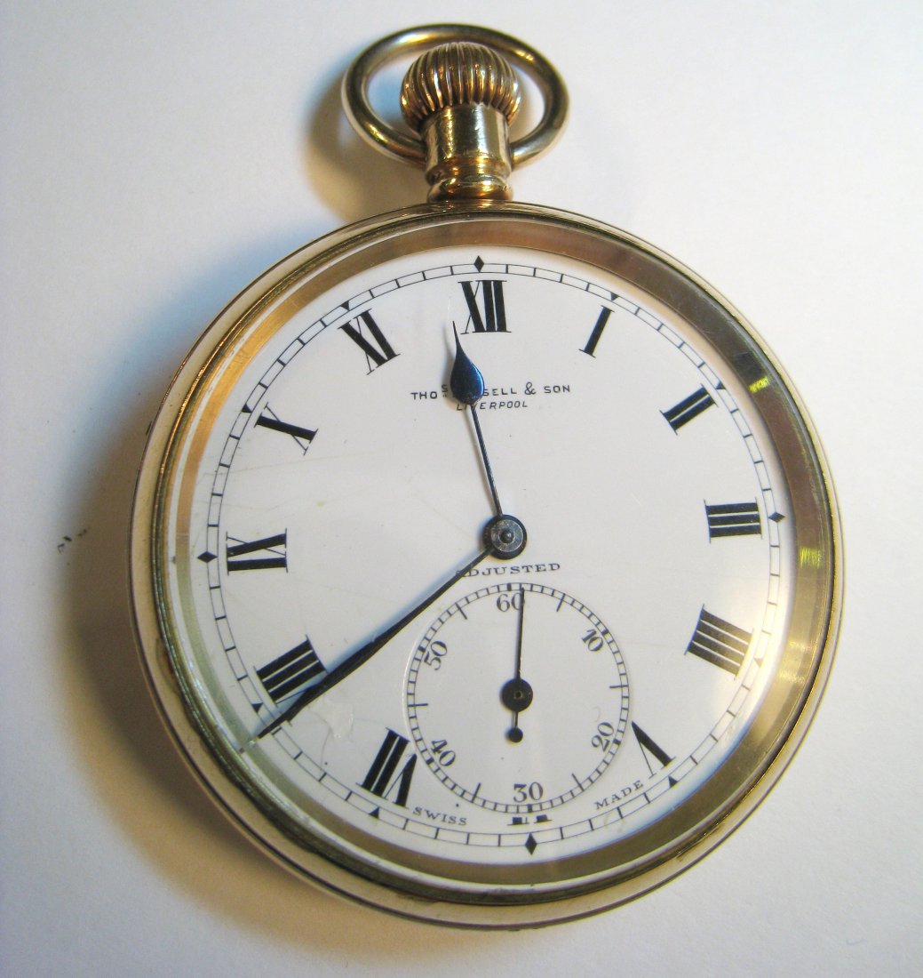 Thos. Russell Pocket Watch: Within a 10 year gold filled 50mm case with a fine 17 jewel movement, running. Shipping: We are able to pack and ship this item to an address in the United States for $15.00 via USPS Priority Mail. Tr