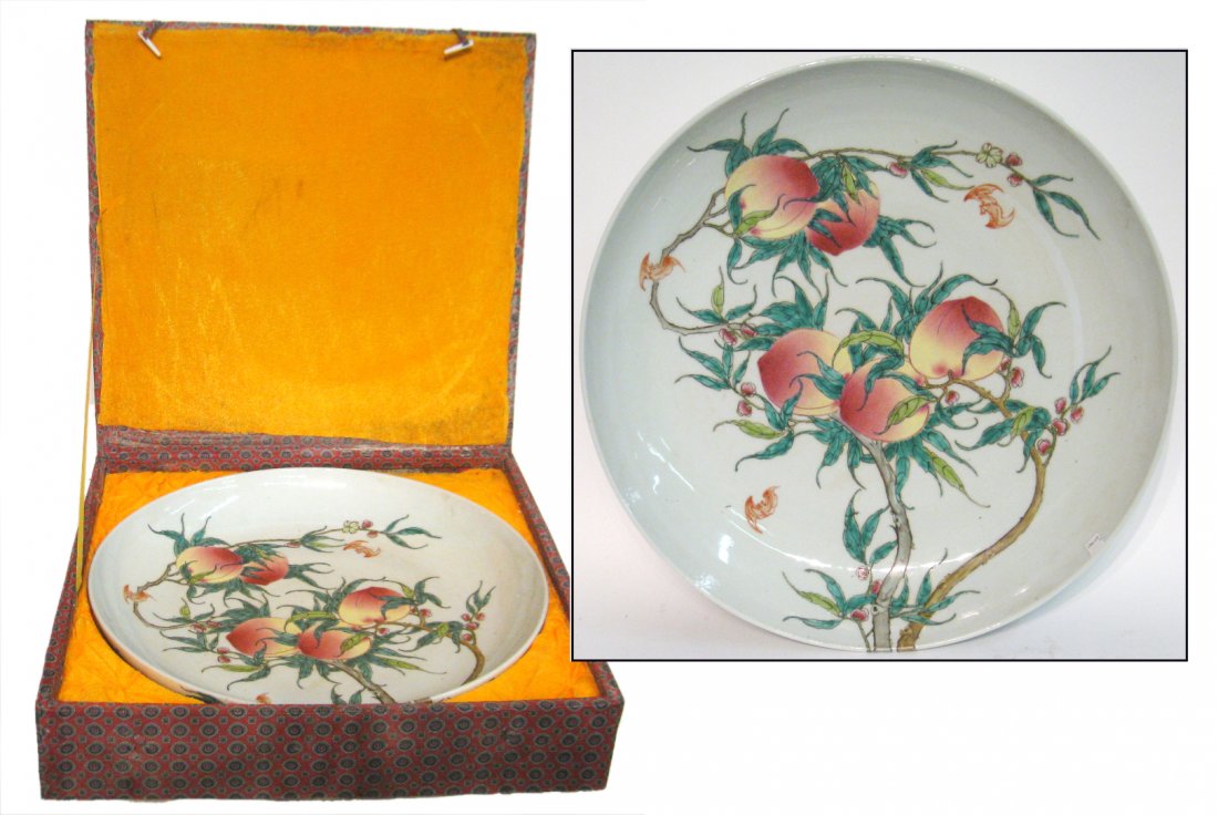 Chinese Charger With Peach Blossoms: In multi colored glaze patterns, a 19 3/4" porcelain charger with blossoming peaches. The bottom with the Yongzheng mark of the Qing Dynasty. Shipping: We are unable to ship this item. Please contact