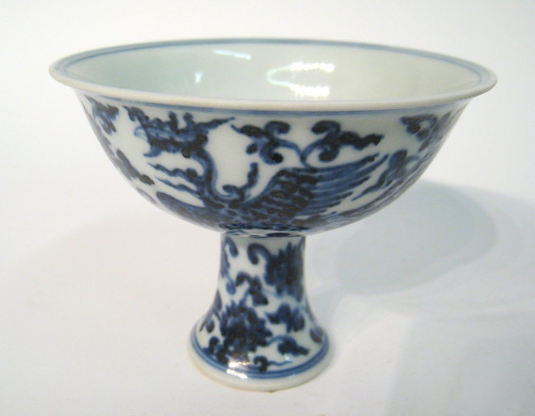 Chinese Cup: High heel blue and white cup, 3 1/4". Shipping: We are able to pack and ship this item to an address in the United States for $25.00 via USPS Priority Mail. Tracking information will be sent to your e
