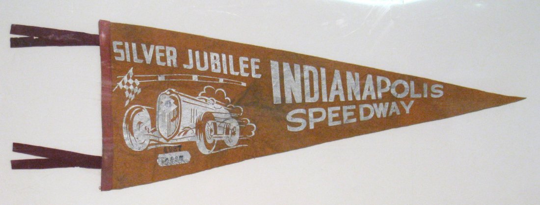 1937 Indianapolis Speedway Pennant: A 34" pennant from the speedway dated 1937. Mounted on covered art board. Shipping: We are able to pack and ship this item to an address in the United States for $25.00 via USPS Priority Mail. Trackin
