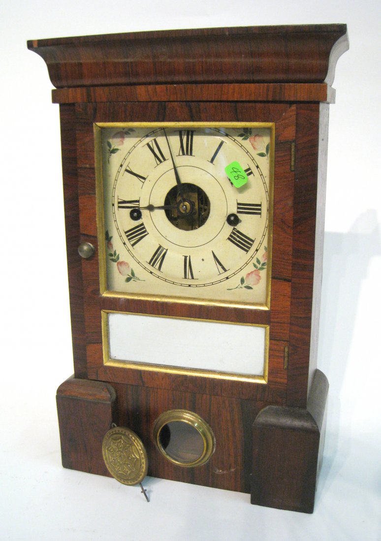 American Shelf Clock: A thirty hour shelf clock of the 19th century. Shipping: We are able to pack and ship this item to an address in the United States for $55.00 via USPS Priority Mail or via FedEx Ground/Home Delivery. 