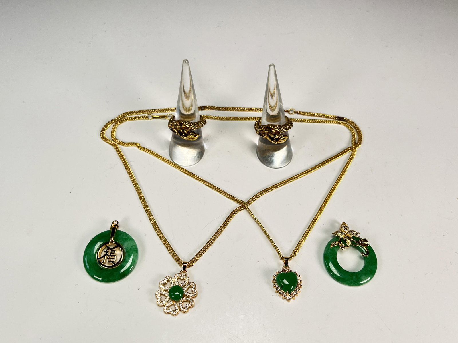 JADE PENDANTS & GOLD TONED RINGS