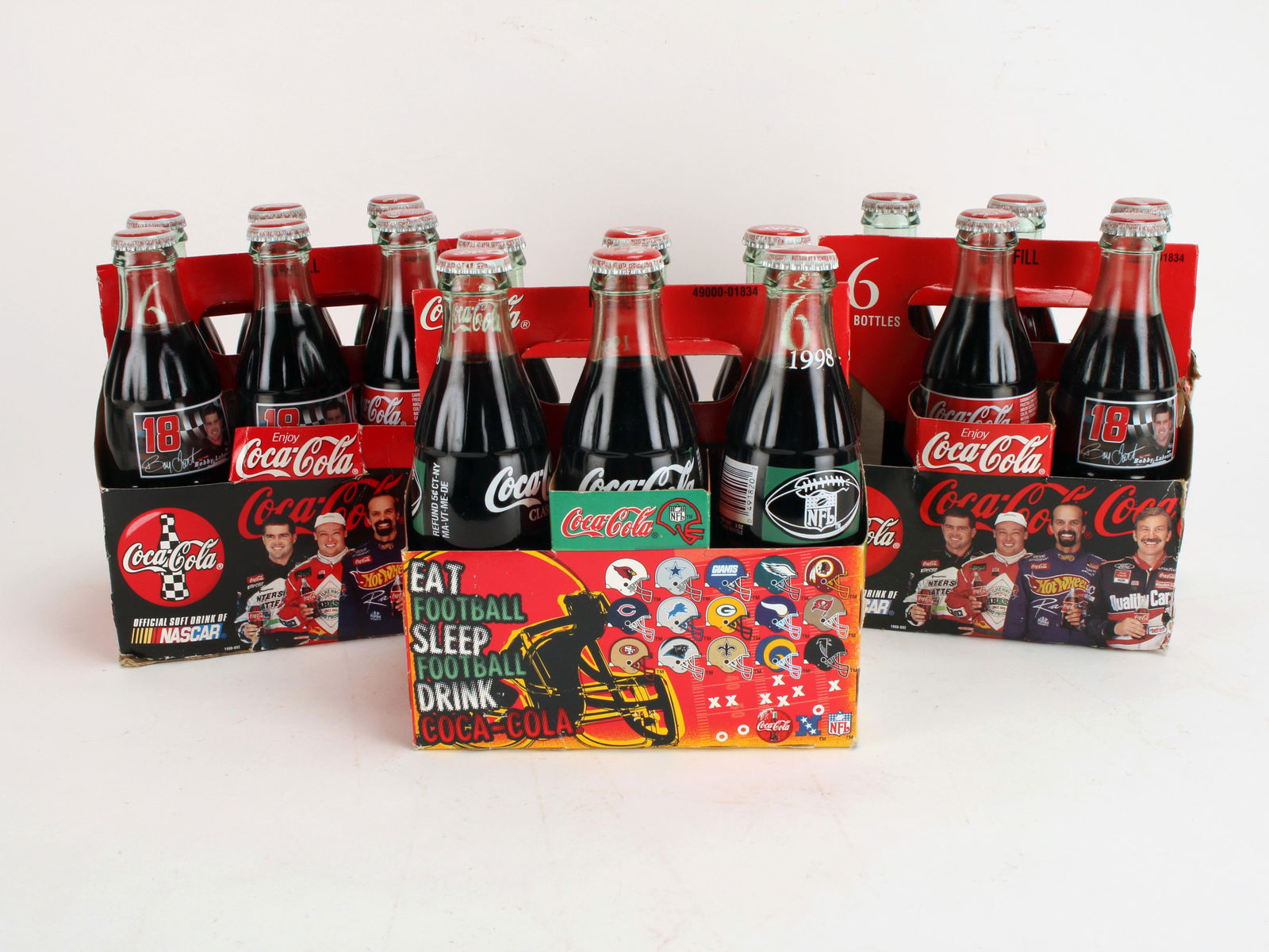 COMMEMORATIVE GLASS COCA COLA BOTTLE SIX PACKS