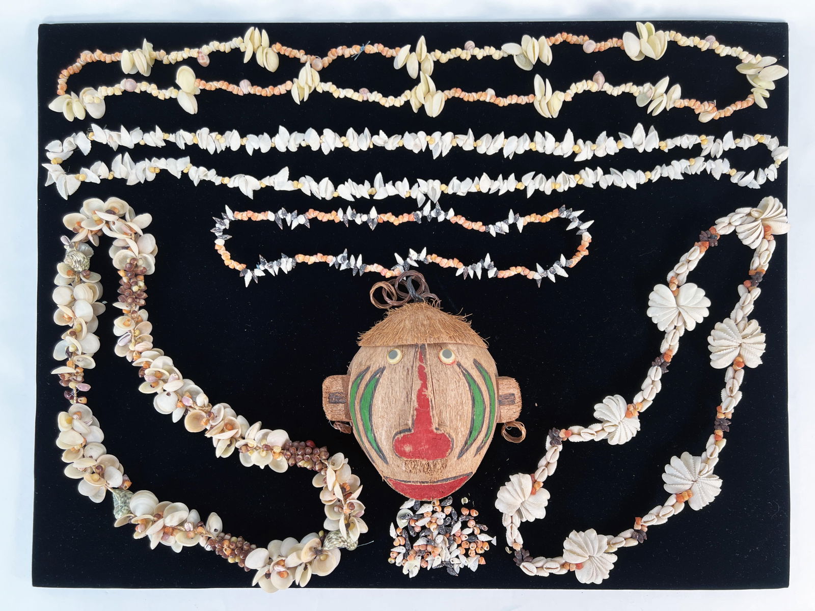 SHELL NECKLACES & COCONUT HEAD (1 of 5)
