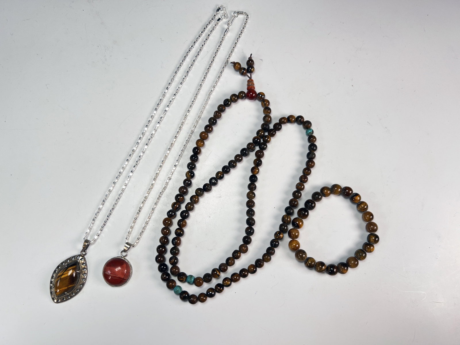3 NECKLACES AND BRACELET
