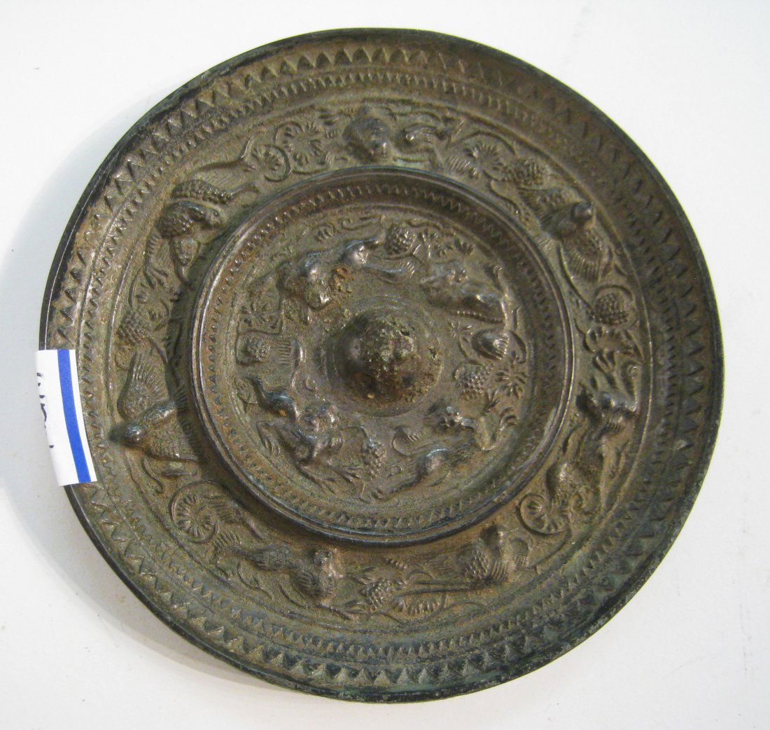 Bronze Mirror: A 5" bronze convex mirror backed with and mounted on cast in decorations. Shipping: We are able to pack and ship this item to an address in the United States for $25.00 via USPS Priority Mail. Trackin