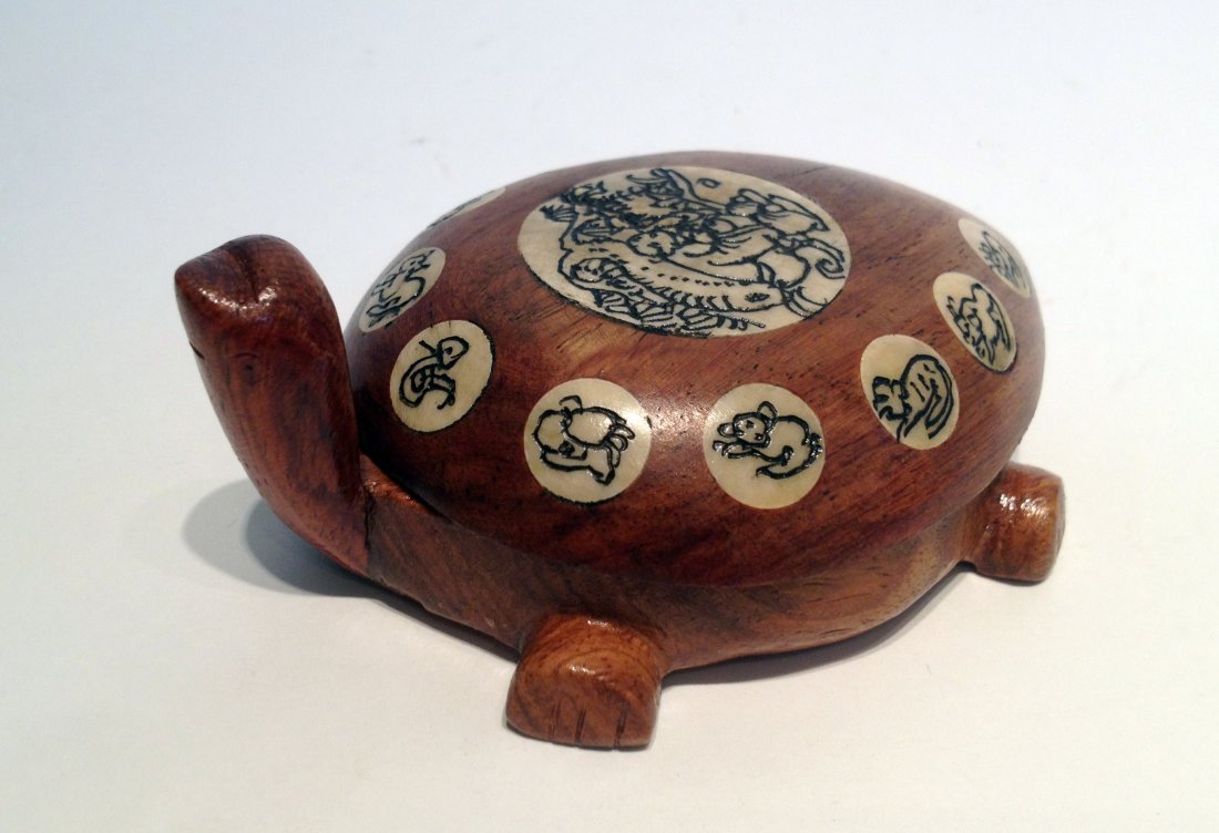 Redwood Fengshui Turtle With Compass: 4" X 3". Shipping: We are able to pack and ship this item to an address in the United States for $25.00 via USPS Priority Mail. Tracking information will be sent to your email address. Each additional