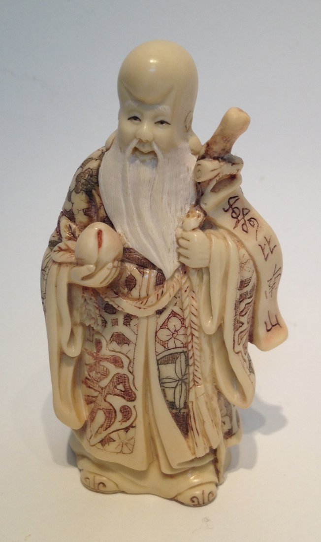 Engraved Ivory Netsuke Buddha: Signature mark on the bottom, from the "Lee Estate of Beverly Hills". 4 X 2 1/4. Shipping: We are able to pack and ship this item to an address in the United States for $25.00 via USPS Priority Mail. 