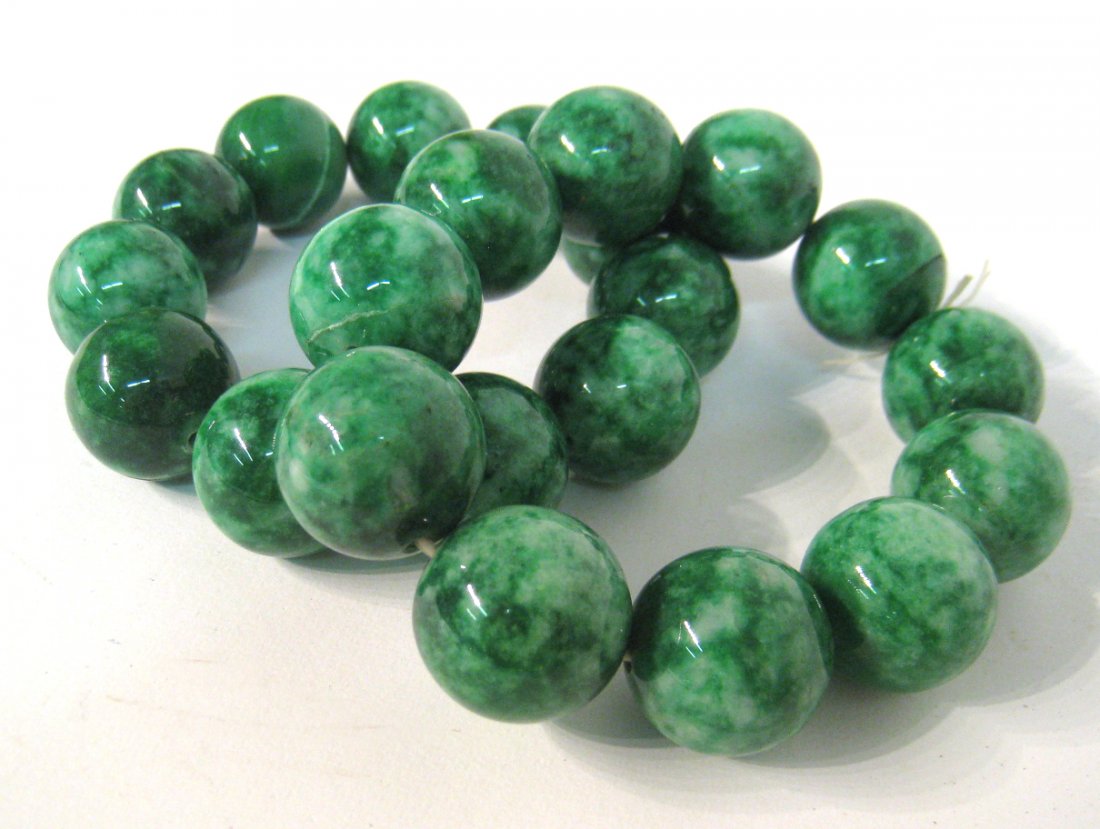 Pair Of Chinese Green Jade Bead Bracelets: 11 beads each. Shipping: We are able to pack and ship this item to an address in the United States for $15.00 via USPS Priority Mail. Tracking information will be sent to your email address. Each addi