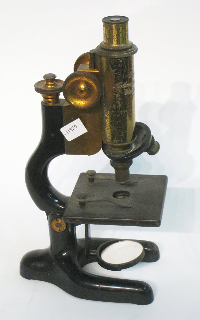 Microscope: Lacquered brass and steel. Shipping: We are able to pack and ship this item to an address in the United States for $40.00 via USPS Priority Mail or via FedEx Ground/Home Delivery. Tracking information