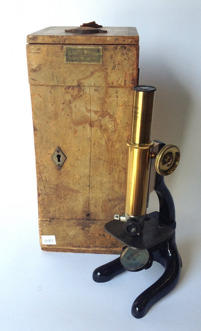 Microscope With Carrying Case: "E. Leitz Wetzlar. no. 77992". Box is 13 1/4" tall. Shipping: We are able to pack and ship this item to an address in the United States for $50.00 via USPS Priority Mail or via FedEx Ground/Home Deliv