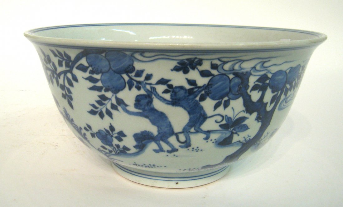 Chinese 19th C. Blue & White Bowl: With monkeys feasting on fresh fruit, 12 1/2" x 6". Shipping: We are able to pack and ship this item to an address in the United States for $50.00 via USPS Priority Mail or via FedEx Ground/Home Deliv