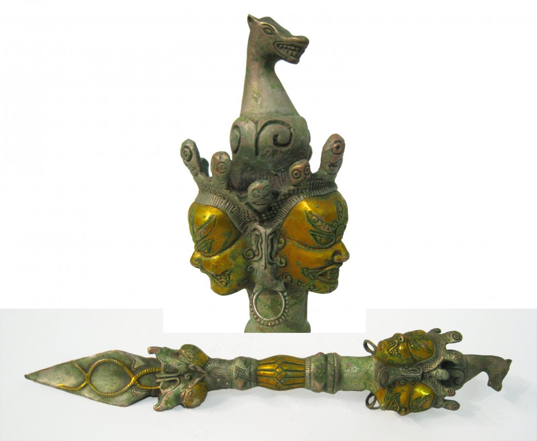 Mongolian Or Tibetan Bronze Temple Dagger: 13 1/4" in height. Shipping: We are able to pack and ship this item to an address in the United States for $25.00 via USPS Priority Mail. Tracking information will be sent to your email address. Each 