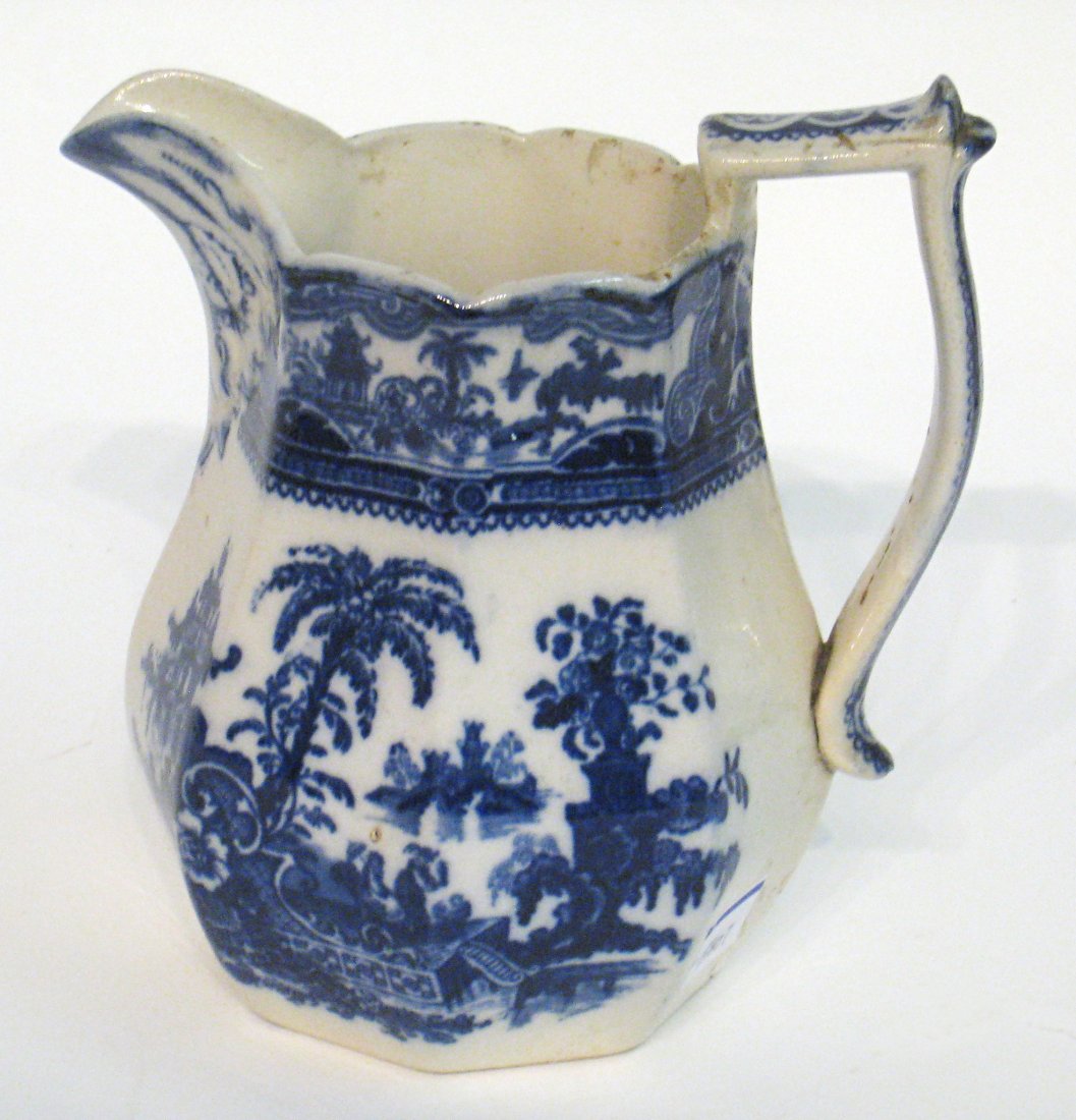 Pitcher: In blue and white goaze transfer, "Willows" style. Shipping: We are able to pack and ship this item to an address in the United States for $40.00 via USPS Priority Mail or via FedEx Ground/Home Delive