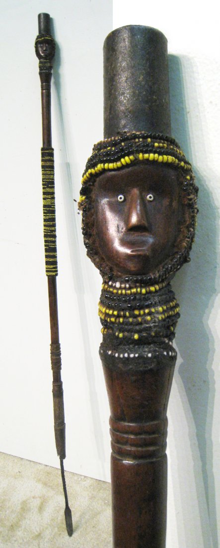 African Spear: A 60" iron tipped spear with bead decoration. Shipping: We are unable to ship this item. Please contact our local UPS Store, store1152@theupsstore.com, or the Packaging Store, hello@packandshipnow.com