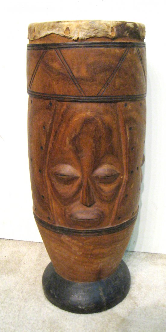Carved African Drum: 28 1/2" Shipping: We are unable to ship this item. Please contact our local UPS Store, store1152@theupsstore.com, or the Packaging Store, hello@packandshipnow.com, for a quote. Please be sure and incl