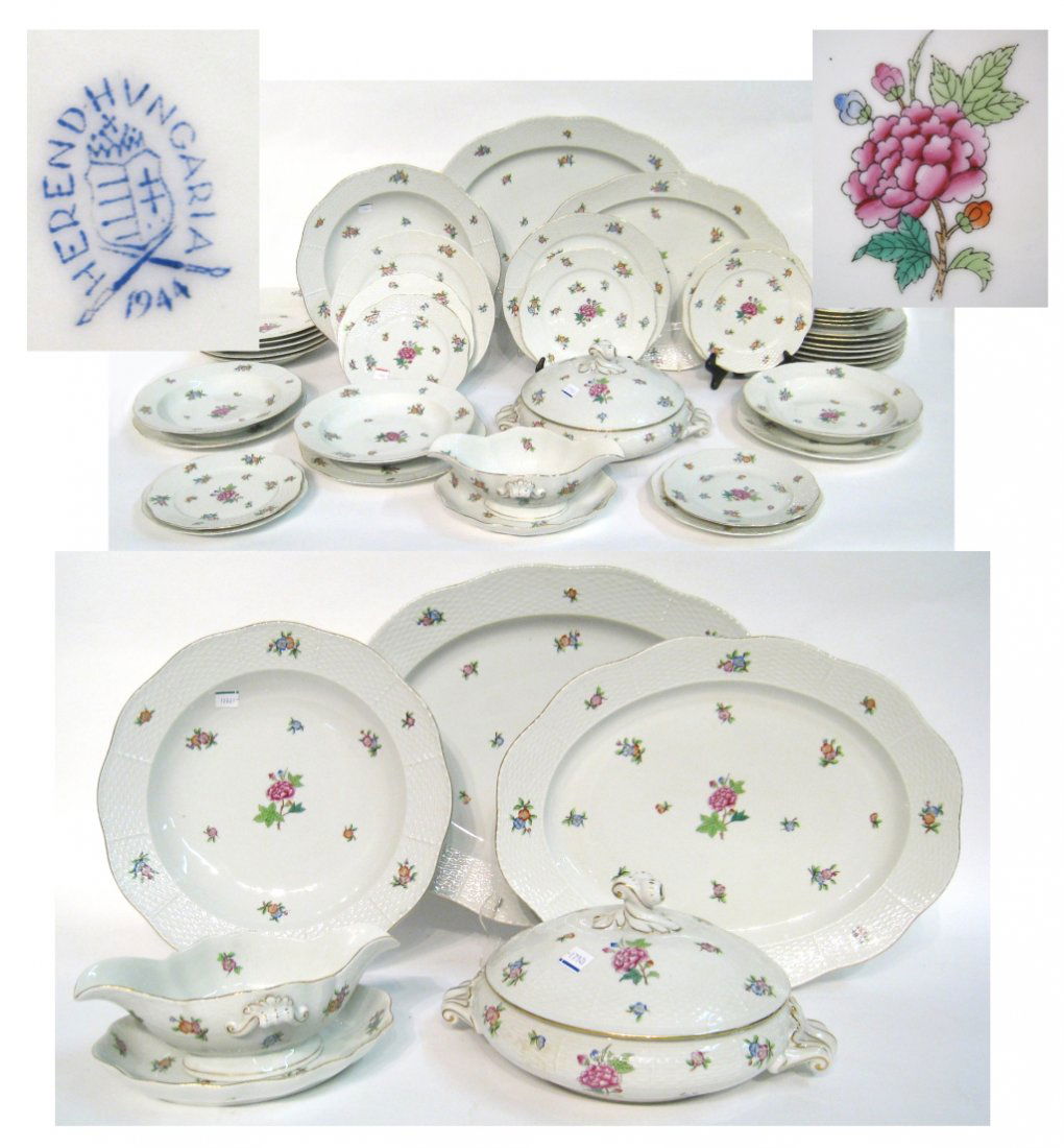Herend Place Settings and Serving Pieces: Dinnerware set of Herend porcelain, with a pattern similar to their "Printemps" series. Hand-painted with blossoms on fine porcelain with a white basket weave border: 20) 11" plates; 5) 8 1/2" plates;