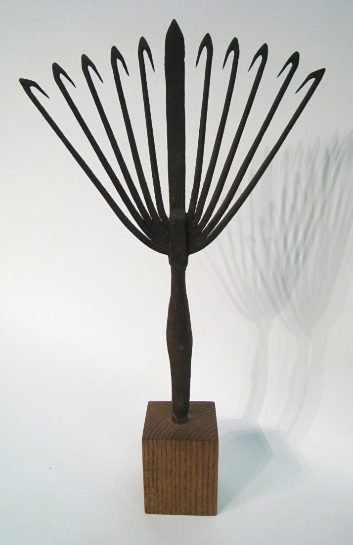 Gigging Spear: Mounted onto a custom stand, about 20" in height. 19th Century, with 10 barbed gigs. Shipping: We are unable to ship this item. Please contact our local UPS Store, store1152@theupsstore.com, or the Pa