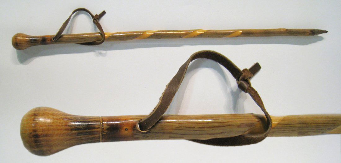 African Walking Staff: A 38" walking staff featuring a course grained hardwood with a carved-in barley twist spiral and a bulbous top. Metal tip. Shipping: We are unable to ship this item. Please contact our local UPS Store