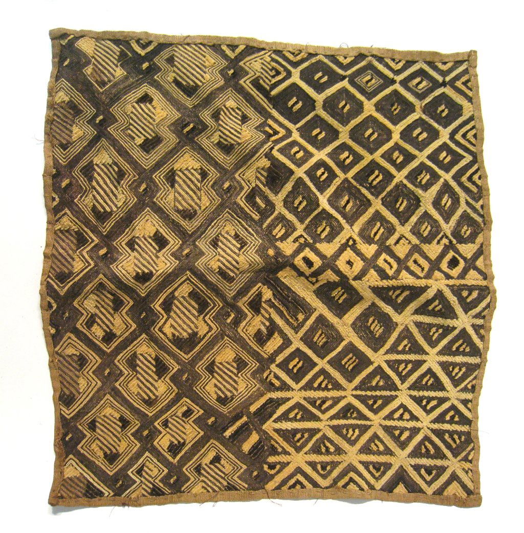 African Mat: A woven mat with black and white patterns, Shipping: We are able to pack and ship this item to an address in the United States for $30.00 via USPS Priority Mail. Tracking information will be sent to y