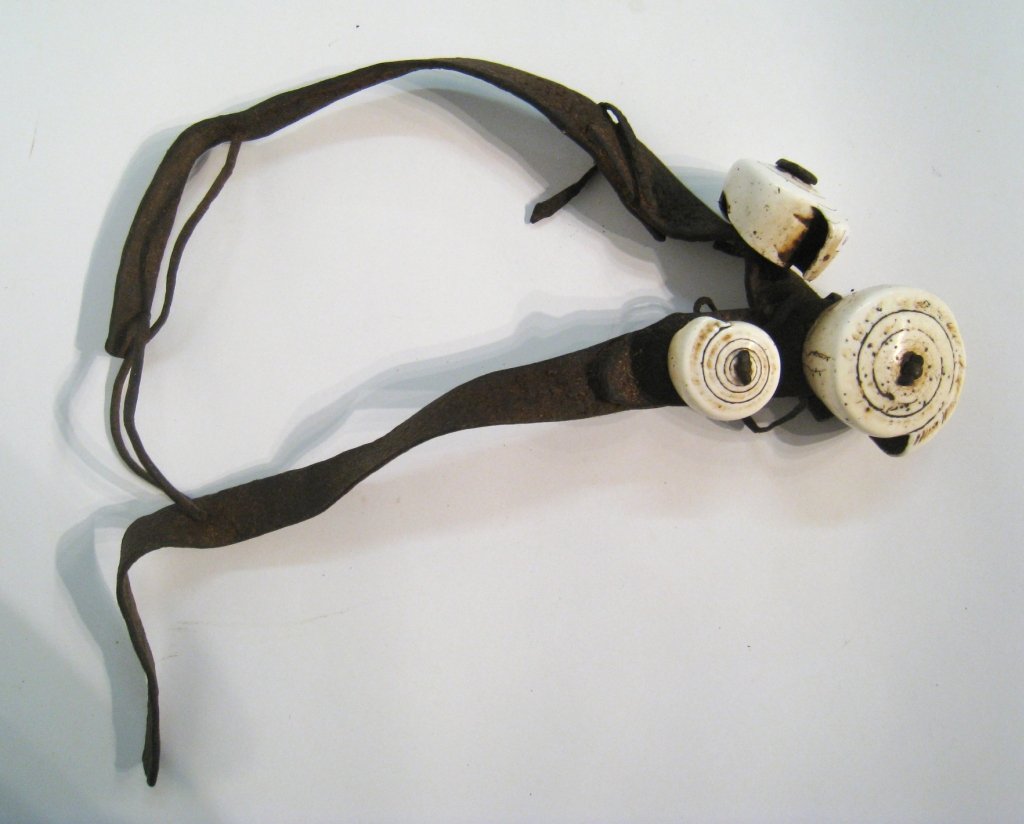 African Leather And Shell Harness Shells: Antique tribal neckdress with shells. Shipping: We are able to pack and ship this item to an address in the United States for $30.00 via USPS Priority Mail. Tracking information will be sent to your e